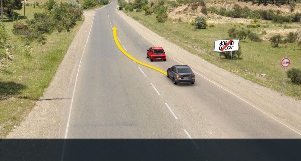 Will the black motor car driver violate the Highway Code in case of proceeding to the arrow direction?