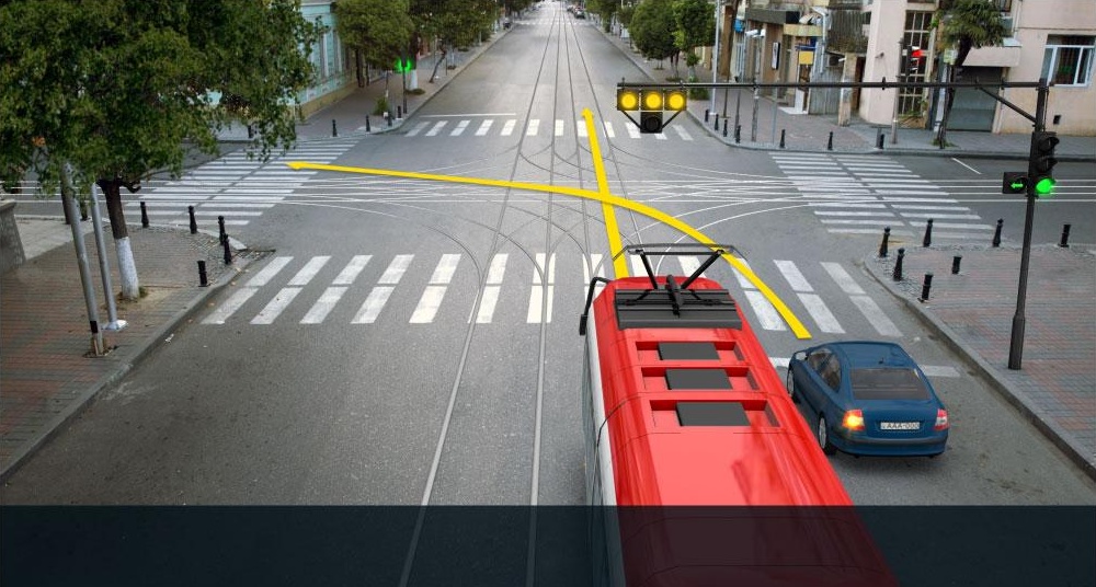 Which of the vehicle drivers is allowed to start proceeding to the arrow direction at this signal of the traffic lights?