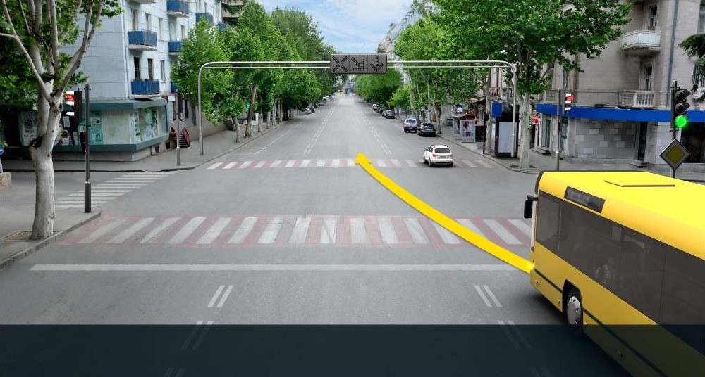 Is the bus driver allowed to proceed to the arrow direction, if reversible traffic lights are off?