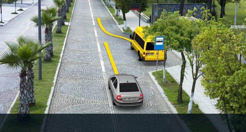 In inhabited area the minibus driver is starting to move from the stopping area, the motor car driver must: